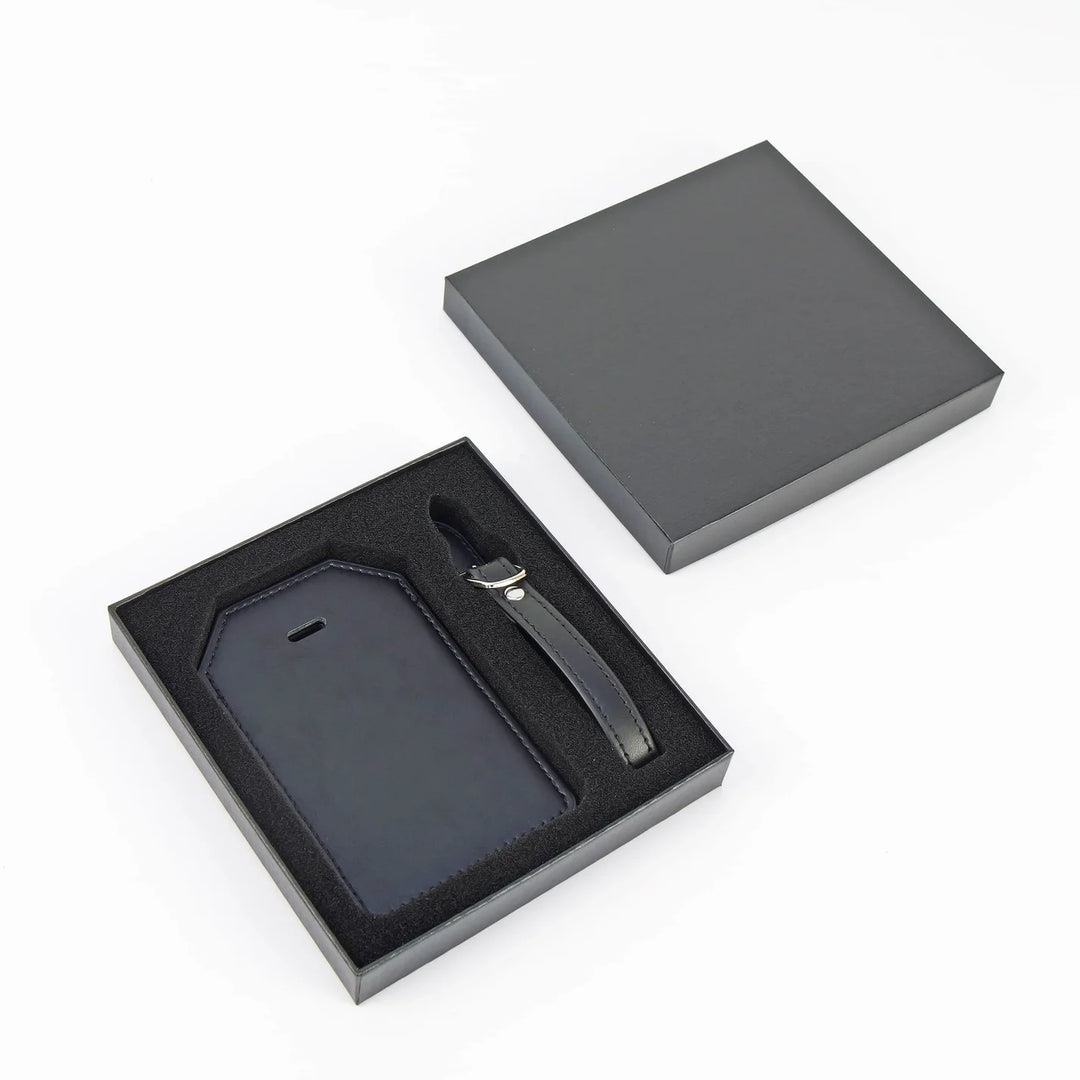 Black leatherette luggage tag with strap in gift box packaging personalized engraved travel tag ready for gifting