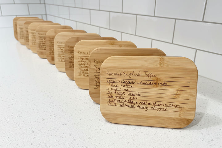 Custom engraved 50 oz rectangular glass food storage container with bamboo lid featuring personalized recipe design