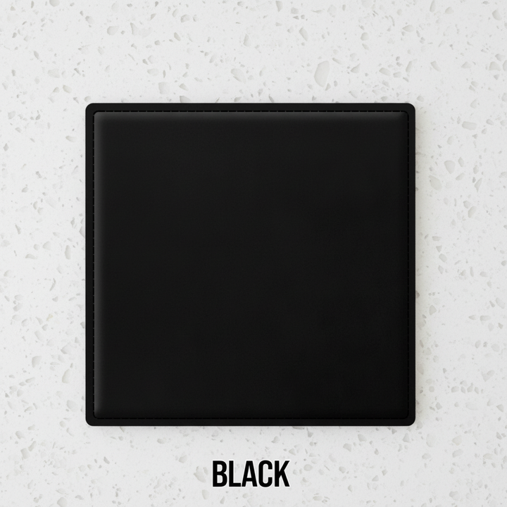 Set of four black leatherette coasters with custom logo branding for weddings, events, and corporate gifts