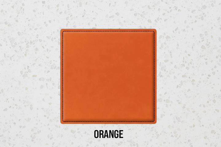 Set of four orange leatherette coasters with custom logo branding for weddings, events, and corporate gifts