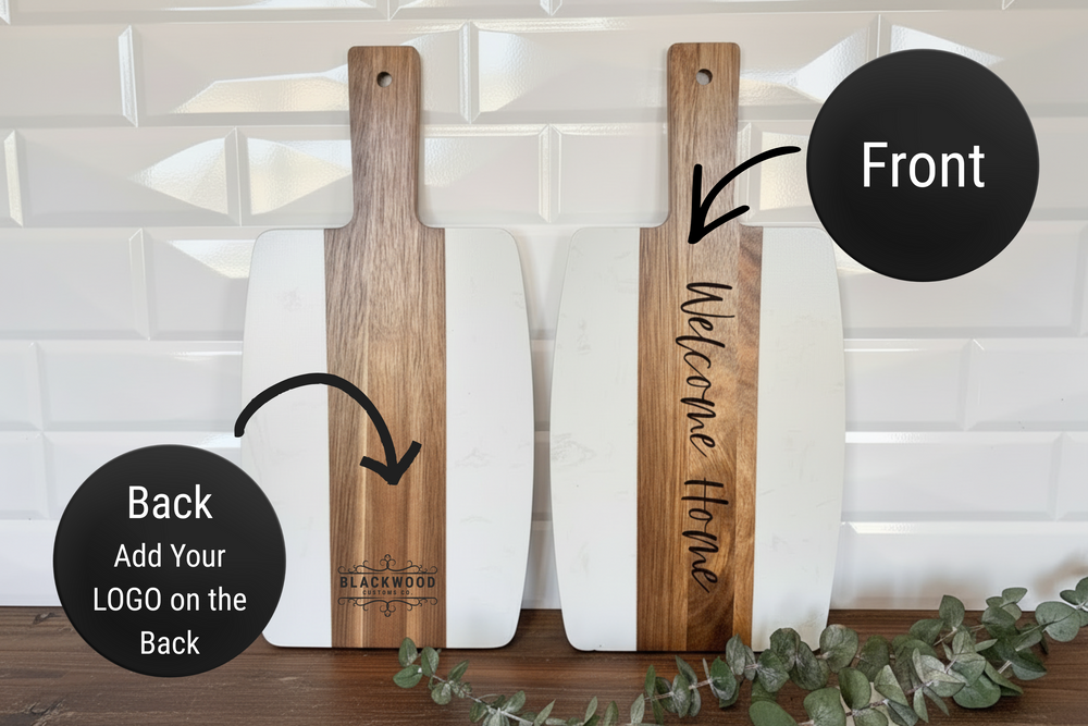 Luxury closing gift set featuring engraved marble and acacia wood board, coasters, and gourmet items arranged for weddings and housewarming gifts