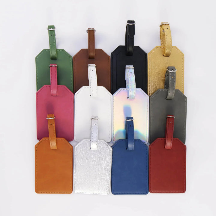 Leatherette luggage tag color options showing multiple personalized engraved travel tags in various colors on white background
