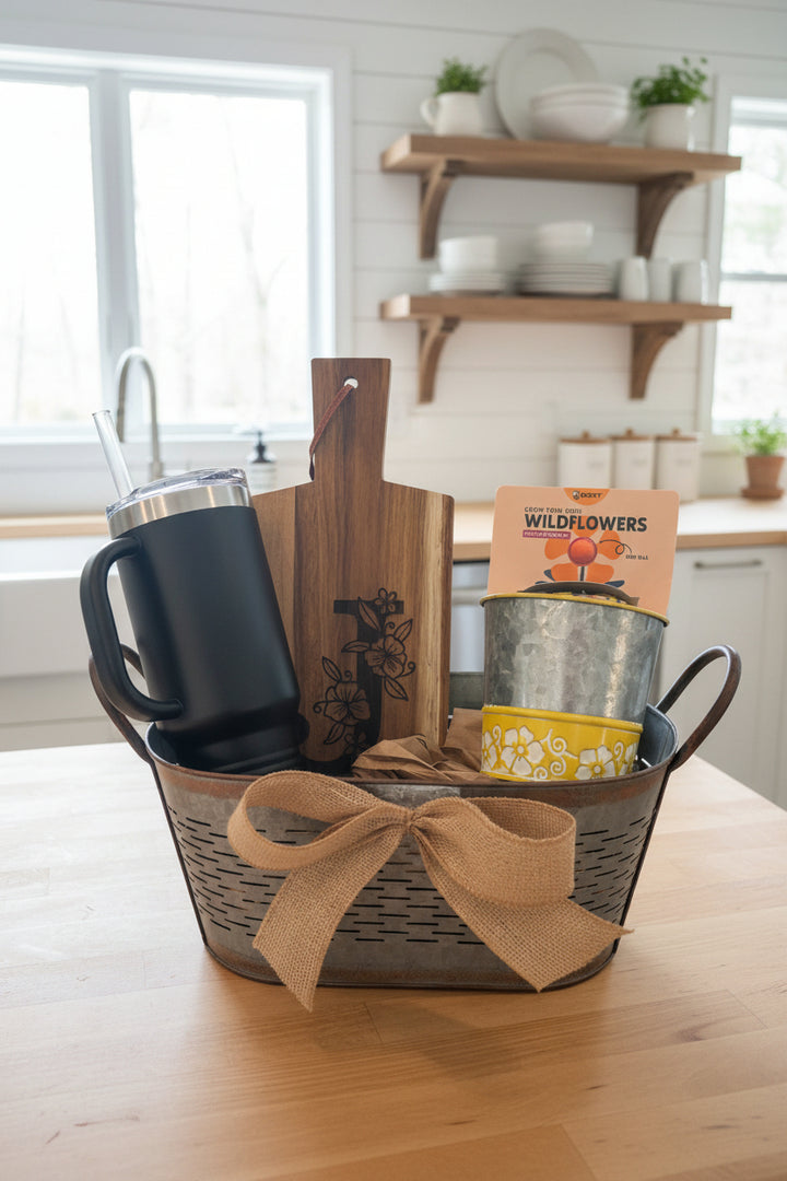 mothers day gift basket for mom with personalized cutting board, mug, and kitchen items displayed on a countertop in a bright kitchen