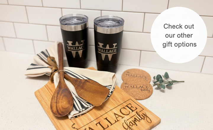 Personalized rubberwood cutting board gift set with engraved family name, tumblers, and wooden utensils for closing and housewarming gifts