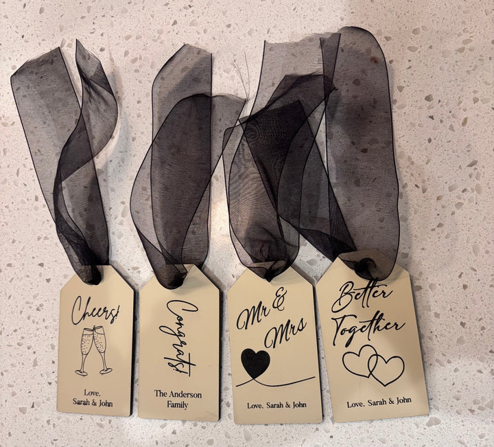 Personalized wedding gift tags with custom engraved designs black ribbon and names perfect for bridal party gifts wedding favors and gift baskets
