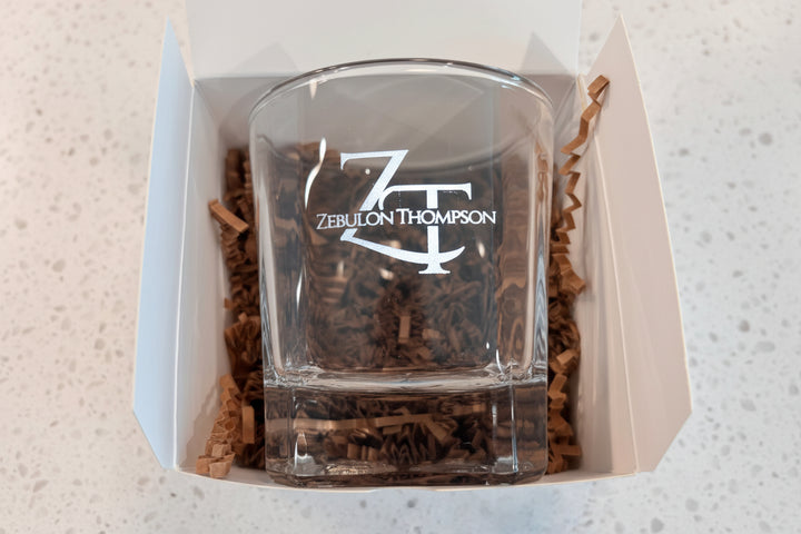 Personalized whiskey glass groomsmen gift in gift box packaging ready for wedding party