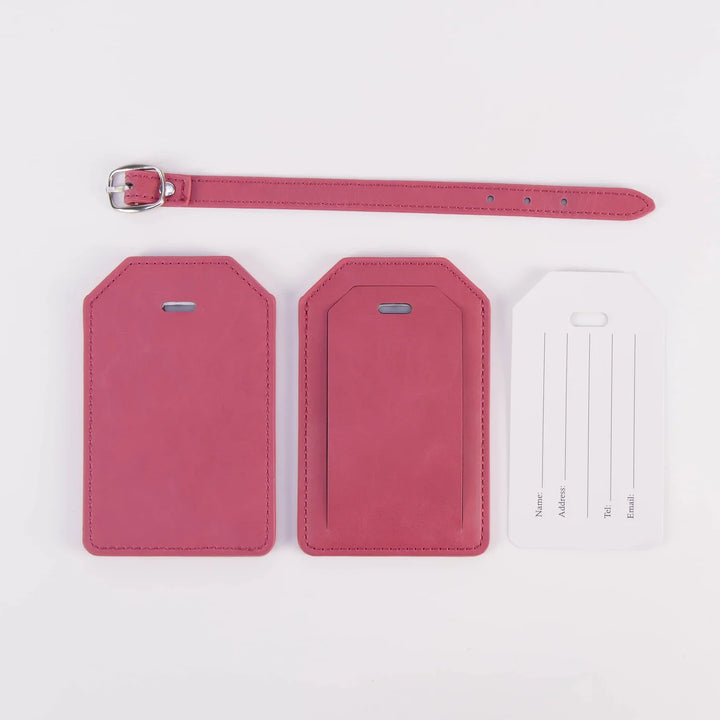 Pink leatherette luggage tag set showing front and back tag insert card and strap personalized engraved travel accessory